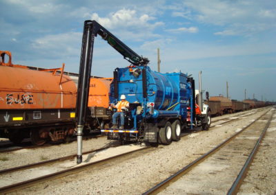 G&T cleaning rail road track in rail yard
